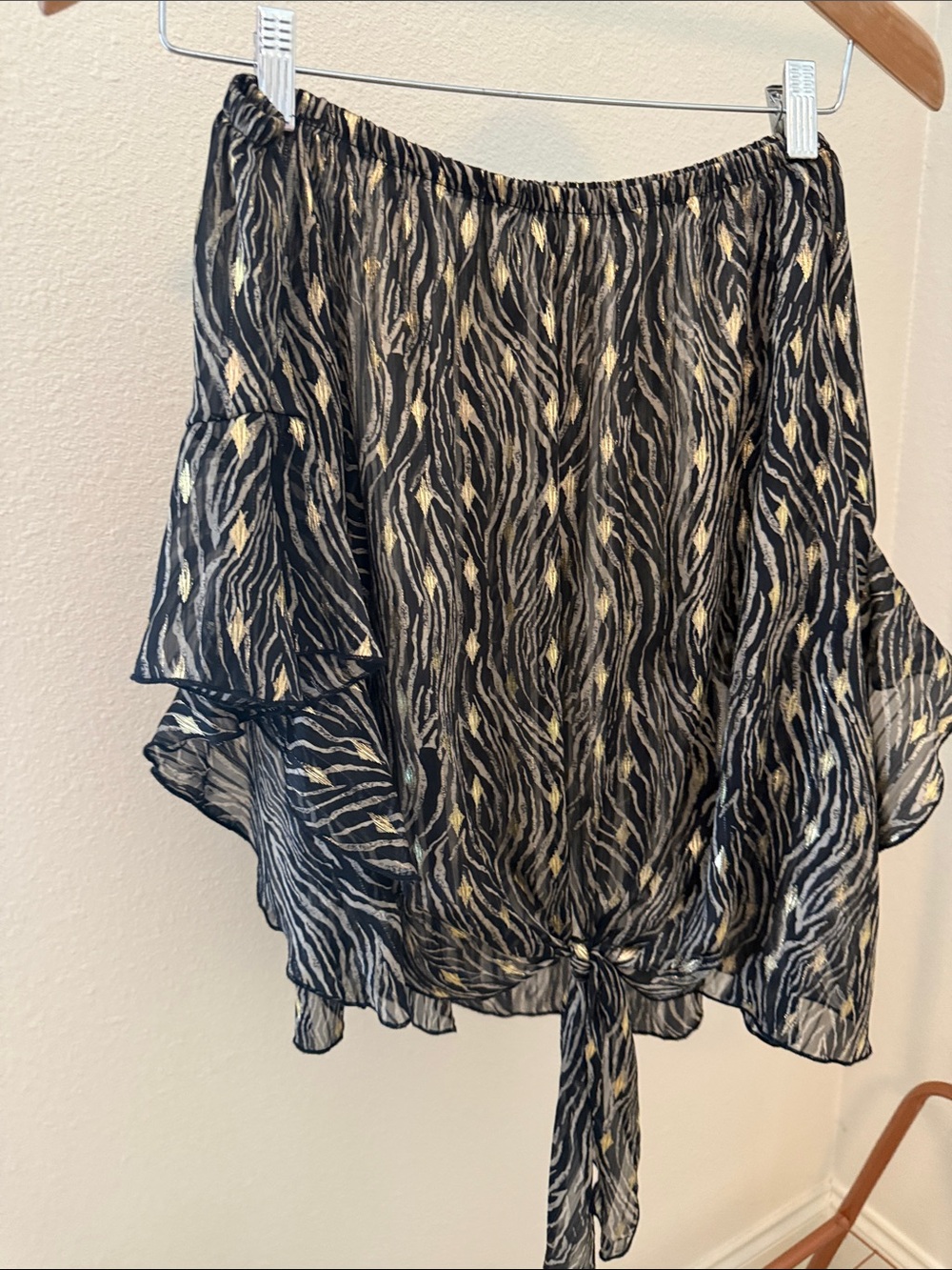 Black Off-Shoulder Blouse with Gold Accent Tie